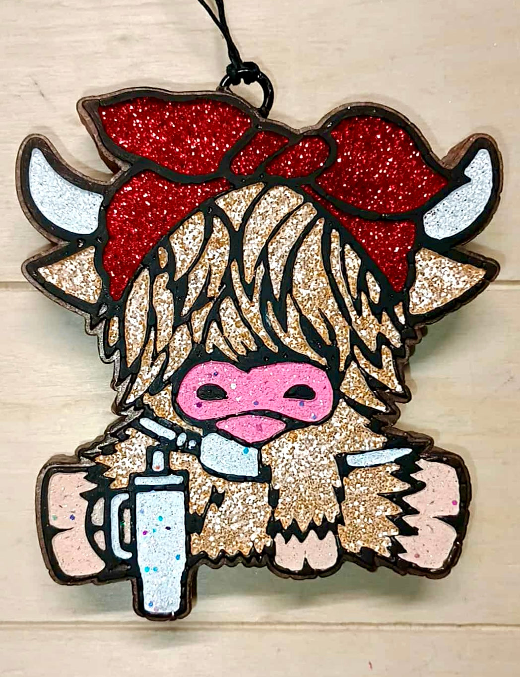 Boujee Sitting Highland Cow With Bow
