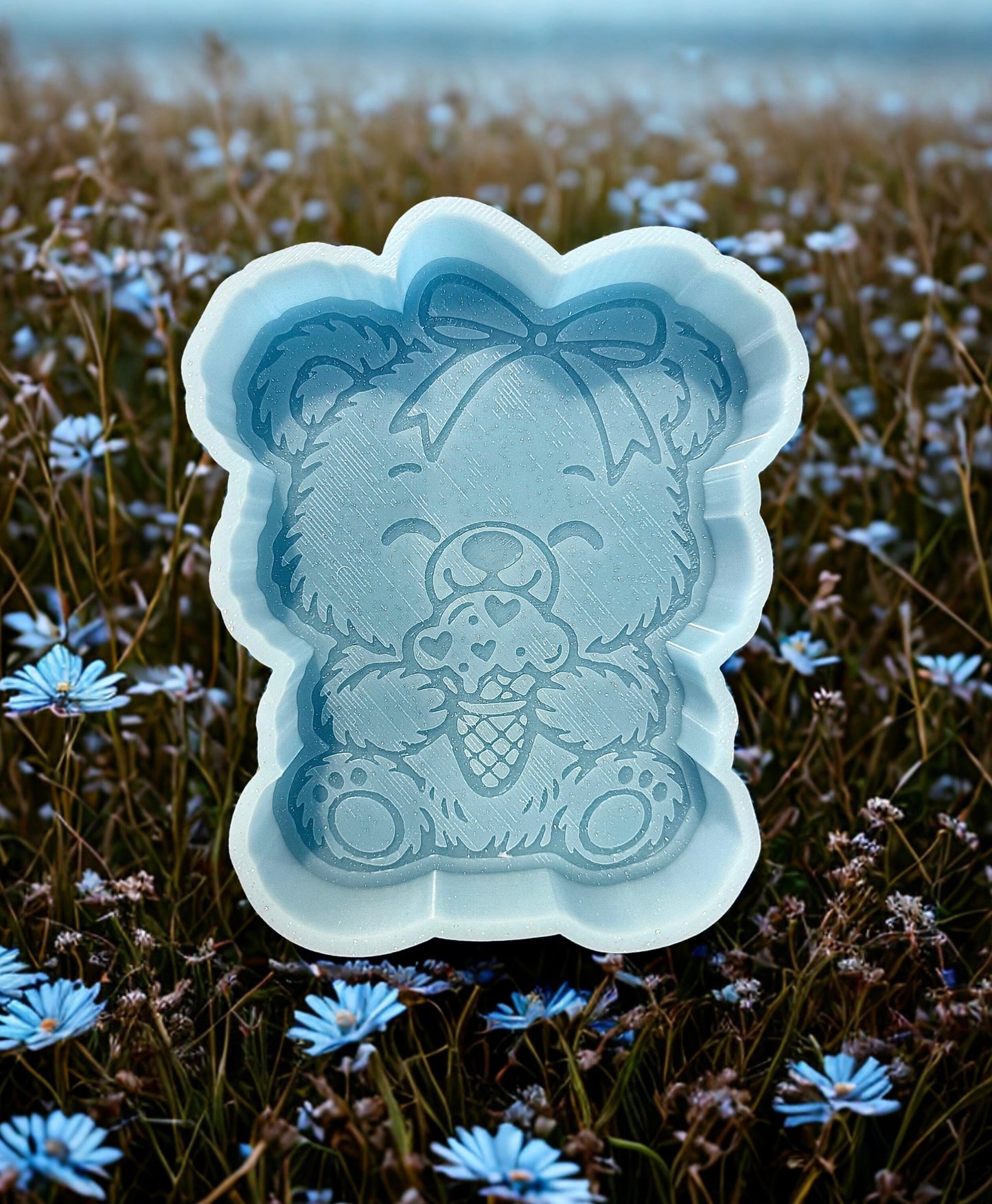 Cute bear holding ice cream