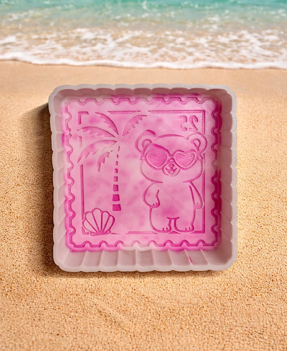Teddy bear on the beach stamp