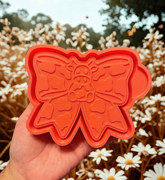 Cow print bow with little cow